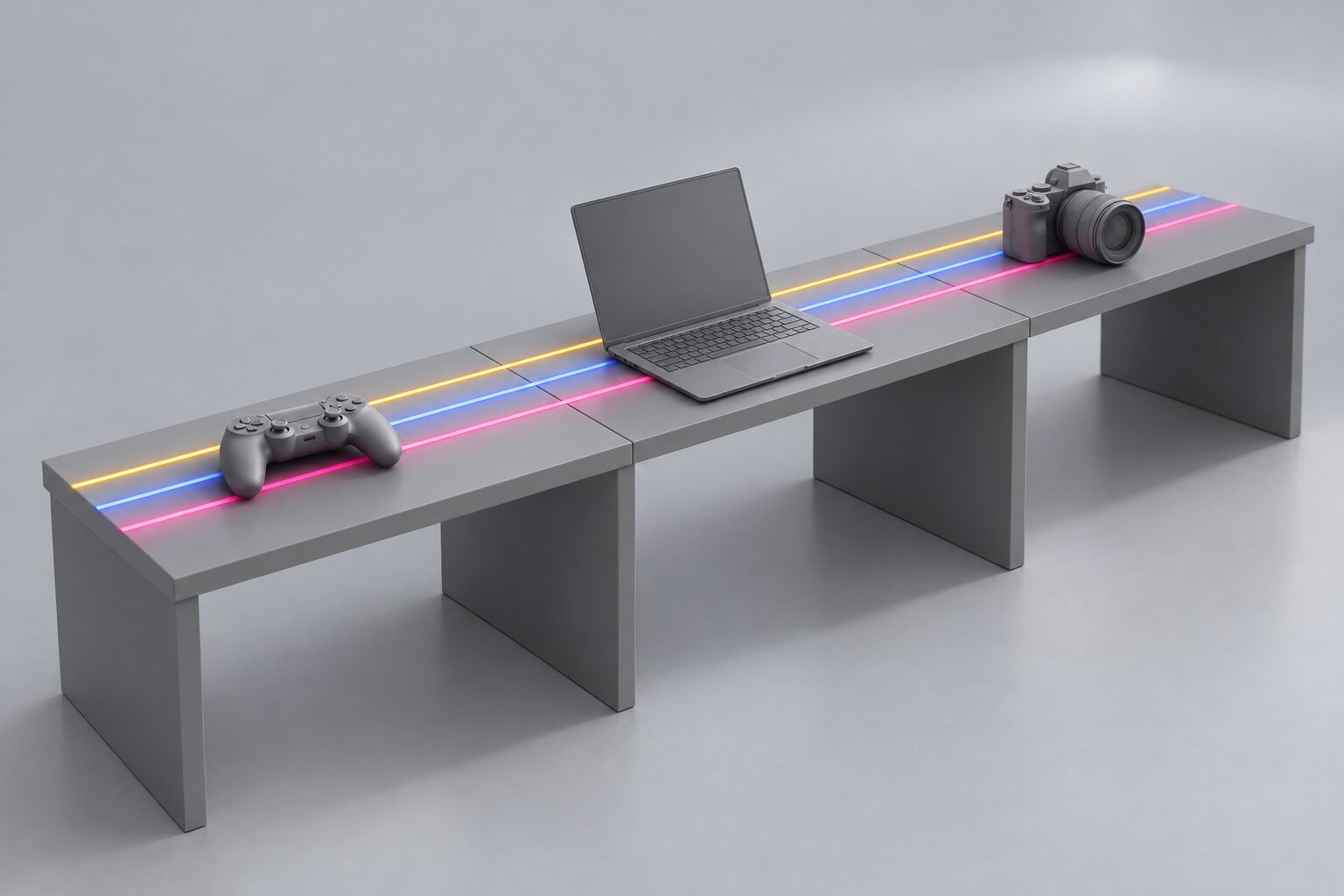 Three grey workbenches joined into one table, with gold, blue and magenta light lines running along it